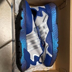 Adidas Blue and Silver Sneakers with Sporty Design